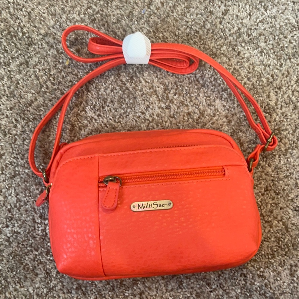 MULTISAC coral crossbody